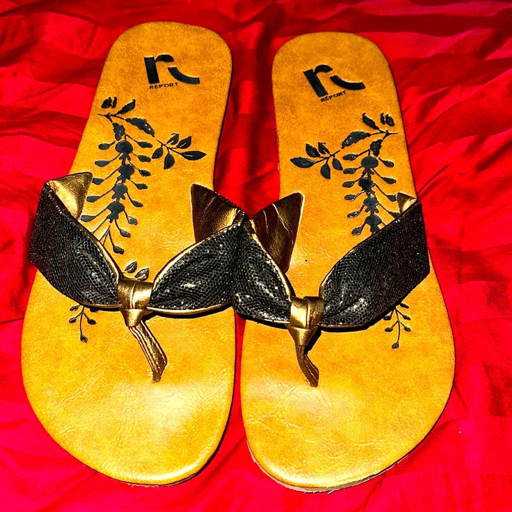 Report The Buckle flip flops